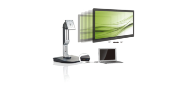 Casual young woman using computer in office