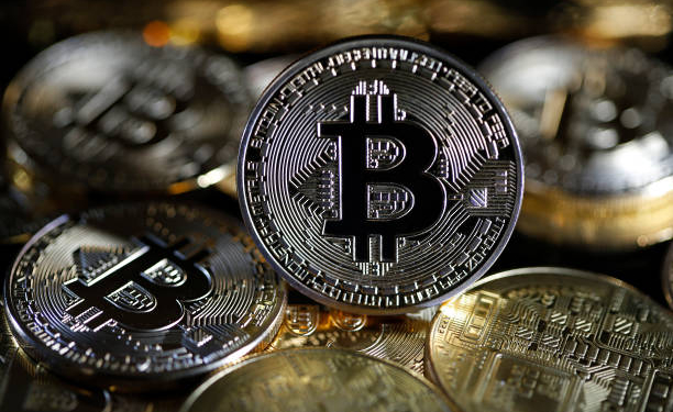 PARIS, FRANCE - FEBRUARY 09: In this photo illustration, a visual representation of the digital Cryptocurrency, Bitcoin is on display on February 09, 2021 in Paris, France. The value of Bitcoin (BTC) has exceeded the threshold of 48,000 dollars for the first time in history. Electric vehicle maker Tesla has invested $ 1.5 billion in the virtual currency and will begin accepting it as payment for the purchase of its cars, the group said. The move comes days after Elon Musk temporarily changed his Twitter mini-description to simply #bitcoin.  (Photo illustration by Chesnot/Getty Images)