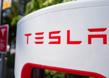 Close up of Tesla logo on a charger at a Supercharger rapid battery charging station for the electric vehicle company Tesla Motors, in the Silicon Valley town of Mountain View, California, August 24, 2016. (Photo by Smith Collection/Gado/Getty Images).