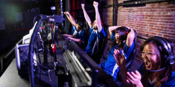 Young professional esports players playing games