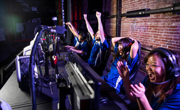 Young professional esports players playing games