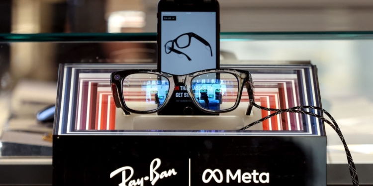 A pair of Ray-Ban Meta smart glasses in a Ray-Ban eyewear store in Rome, Italy, on Friday, July 11, 2025. Meta Platforms Inc. bought a minority stake in the world's largest eyewear manufacturer, EssilorLuxottica SA, deepening the US tech giant's commitment to the fast-growing smart glasses industry, according to people familiar with the matter. Photographer: Alessia Pierdomenico/Bloomberg via Getty Images